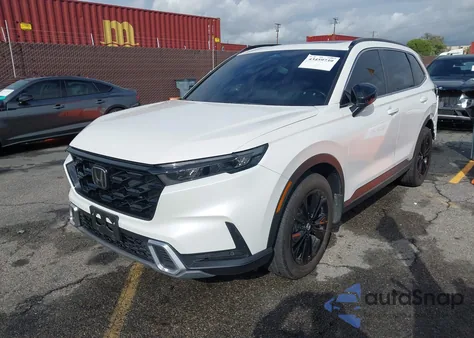 2023 Honda Cr-V Hybrid Sport Touring z USA, uszkodzony, nr VIN 5J6RS6H90PL009467